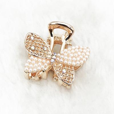 China European and American style custom small crystal rhinestone jaw pearl hair clip mini metal bow hair claw for women and girls for sale