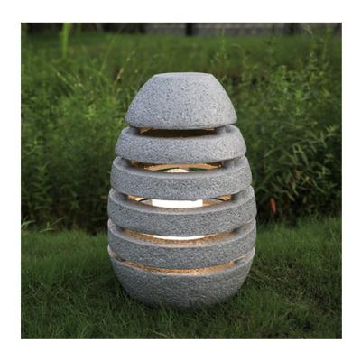 China Modern Decorative Egg Shaped Natural Stone Garden LED Light Lantern for sale