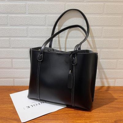 China Normcore/Minimalist Leather Fashion Vegan Large Capacity High Quality Handbag For Ladies Shoulder Tote Bag Of Women for sale