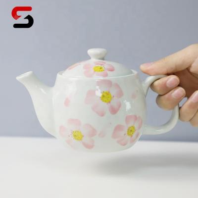 China Viable Wholesale Custom Egrand Japanese Style Ceramic Teapot Stainless Steel Lid Teapot and Porcelain Infuser with Infuser for sale