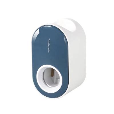 China Viable Automatic Wall Mounted Toothpaste Dispenser Holder Toothpaste Squeezer Dispenser Automatic Toothpaste Squeezer For Washroom for sale