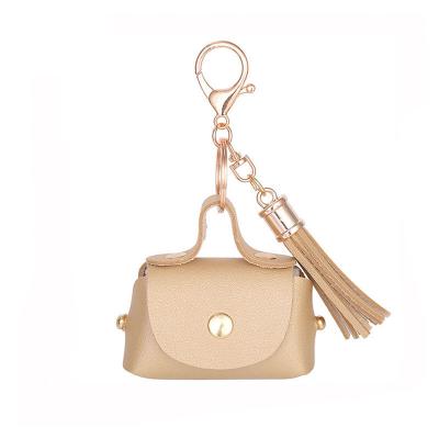 China Creative Decoration Yiwu Mini Coin Purse Key Chain Bag With Tassel for sale