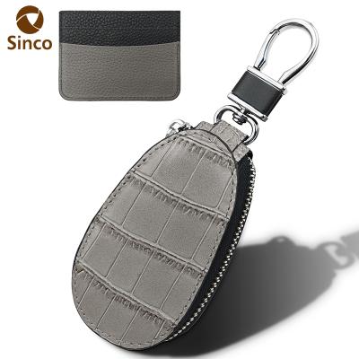 China Fashion new factory price reliable quality handmade genuine leather car key case with key chain for sale