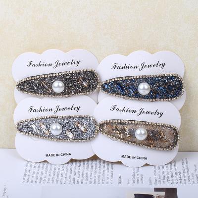 China Wholesale Rhinestone Crystal Bobby Pin Solid Color Leather Blow Hair Clips 2022 New Pearl Flower Pearl Hair Clip For Women for sale