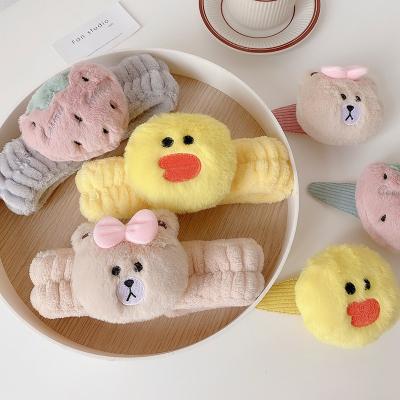 China Fashion Custom Designed Cute Duck Bear Spa Headband Strawberry Makeup Bow Flannel Face Wash Hair Band Headband For Woman Makeup for sale