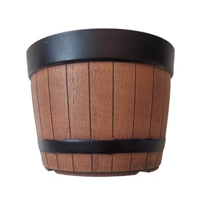 China New American Style Factory Customized Special Design Wooden Barrel Texture Custom Round Plastic Planter Pots for sale