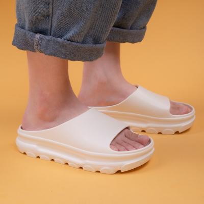 China Women's Wear Solid Color EVA Simple Thick-soled Anti-skid Slippers Step On Excrement Sandals And Slippers In Summer for sale