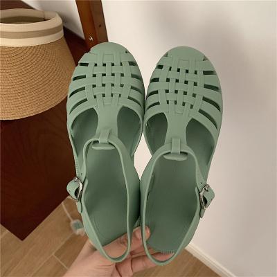 China New Central Institute of Statistics anti-skid fairy fashion wind sandals students wear retro Japanese flat woven summer hollow sandals women for sale