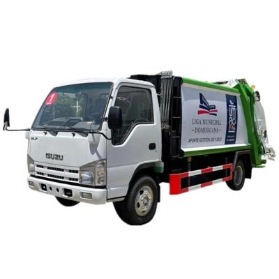 China Building material stores Japan Isuzu 5cbm garbage compactor rear loading truck for sale for sale