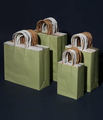 China Recyclable Custom Logo Printed Paper Bag With Handles for sale