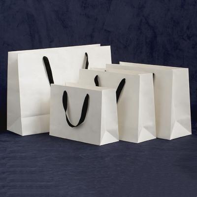 China Recyclable Custom Logo Printed Paper Bag With Handles Customized Paper Bag for sale