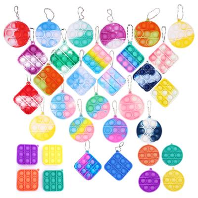 China Key Chain Mini Poping Fidget Sensory Squeeze Toy Rainbow Pop Keychain Bulk Educational Bubble Shaker Funny Finger Shake Toys for sale