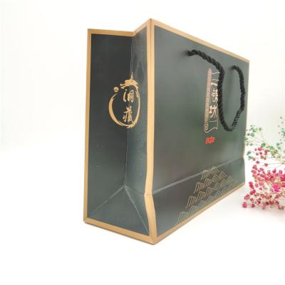 China Factory Custom Printing Logo Gift Bag Paper Bag Tote Bag Three Strand Rope Handle Recyclable for sale