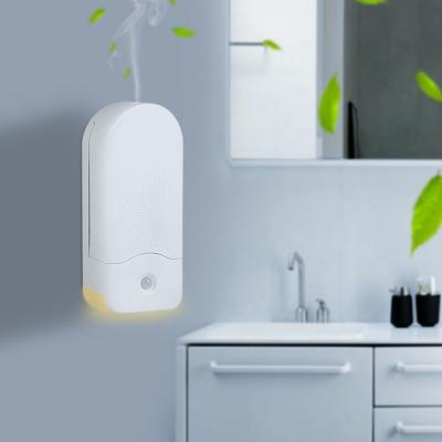 China Mini Household Human Body Smart Induction Scent Aroma Machine Essential Oil Diffuser Wall Mounted Waterless Nebulizer for sale