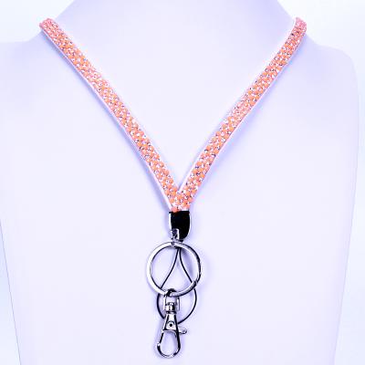 China Durable Hot Selling Orange Rhinestone Lanyard Necklace Key Chain Lanyard for sale