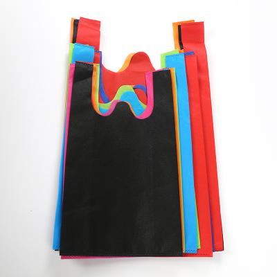 China Eco - Friendly Custom Reusable W Cut Nonwoven T Shirt Vest Bag Shopping Bag for sale