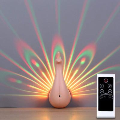 China Colorful Led Peacock Wall Light Peacock Projection Lamp Home Decor Remote Control Home Romantic Atmosphere Corridors Background Night Light for sale