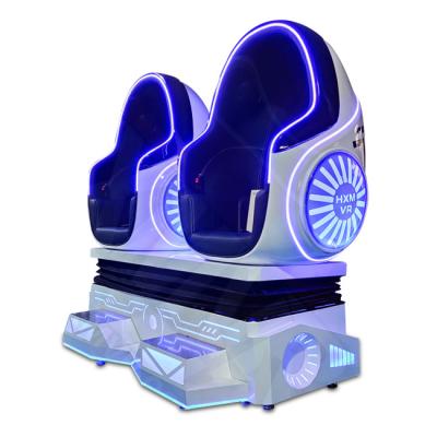 China Hot sale metal 2 seats 9d vr cinema price 9d egg vr cinema vr game machine for amusement park for sale