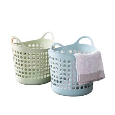 China Sustainable Hot Selling Hollow Design Colored Plastic Storage Basket Cloth Laundry Hamper For Bathroom for sale