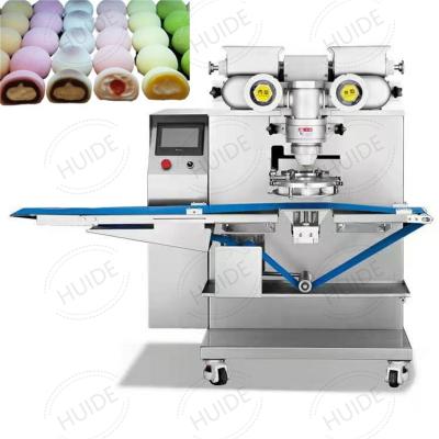 Cina Mochi Making Machine Huide Automatic Mochi Making Machine Filled Encrusting Cake Making Machine Mochi Encrusting Machine in vendita