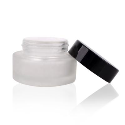 China 30g Round Eye Cream Frosted Skin Care Cosmetic Cream Glass Jars With Black Lid for sale