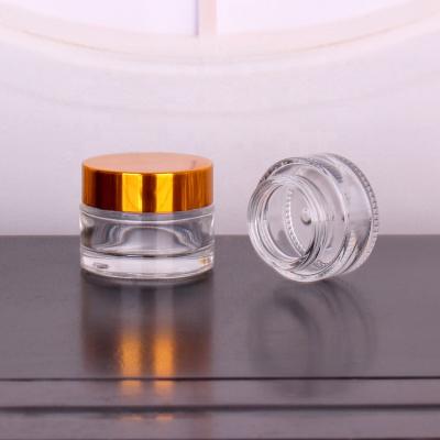 China Skin Care Cosmetics 20g Cream Containers And Packaging Glass Cream Jar With Gold Lids for sale