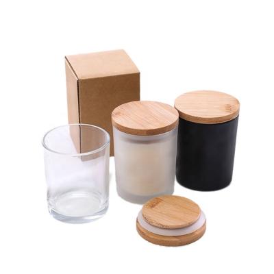 China Eco - Friendly Recyclable Custom White Frosted Matte Black Candle Jar Candle Container With Wooden Lid for sale