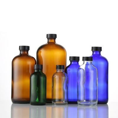 China 1oz 2oz 4oz 8oz 16oz 32oz Boston Clear Blue Green Amber Round Glass Bottles For Liquid Medicine for sale