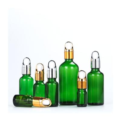 China Eco-friendly 5ml 10ml 15ml 20ml 30ml 50ml 100ml essential oil dropper bottle eco-friendly green blue glass bottle with dropper for sale