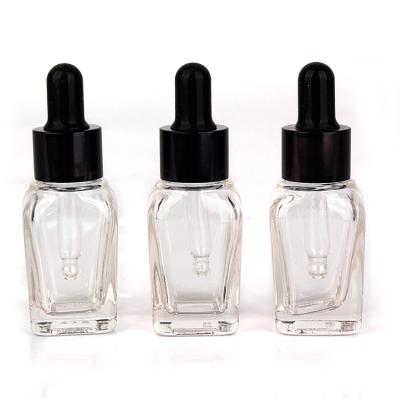 China Eco-friendly high quality square 15ml clear glass dropper bottle for cosmetic eliquid essential oil for sale