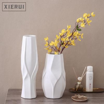 China Nordic Modern Ceramic Cream Matte Black And White Warm Minimalist Vase Tabletop Sale Luxury Creative Luxury Flower Vase For Home Decor for sale