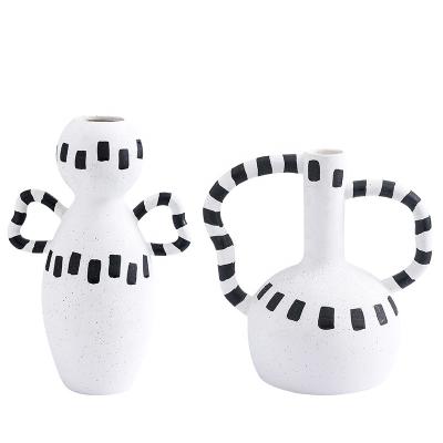 China Nordic creative luxury geometric flower vase shaped simple modern minimalist ceramic vase ornaments for home decor for sale