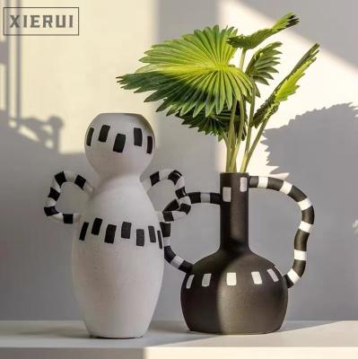 China Bauhaus Minimalist Style Nordic Ceramic Striped Vase Ornaments Hotel Luxury Home Decoration for sale