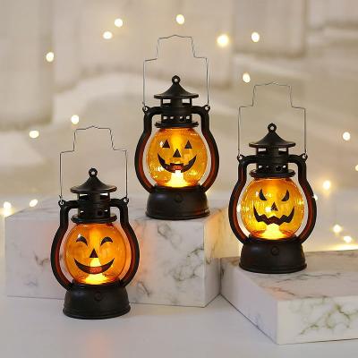 China Plastic Festival Decoration Halloween Pumpkin LED Pony Lantern Decoration For Home Bar Party Ornament With Portable Handle for sale