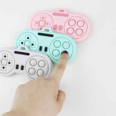 Китай Продукты прорезывания зубов младенца - игрушки teethers силикона формы регулятора игрока мультфильма Washable различных цветов изготовленные на заказ милые продается