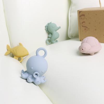 China Custom Popular Silicone Ocean Animal Octopus Fish Turtle Seahorse Kids Baby Bath Toys Gift Set Water Spray Squishy for sale