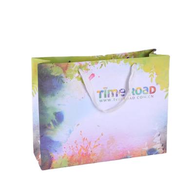 China OEM Recyclable Quality China Made Fashion Color Paper Bag With Handles Festival Gift Bag Shopping Bags for sale