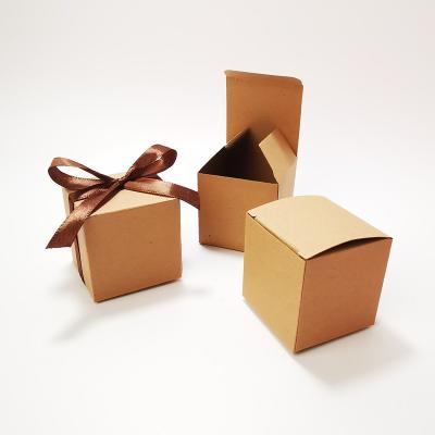 China Recycled Materials Kraft Paper Gift Boxes Personality Wedding Small Square Candy Box With Ribbon for sale