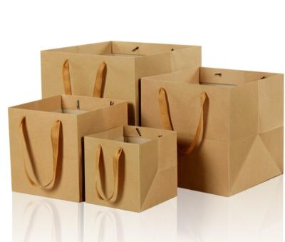 China Various Handmade Flat Paper Handles Brown Take Out Fast Food Wrapping Paper Bag For Restaurant Packaging for sale