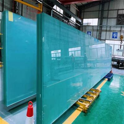 中国 Super High Strength / Safety Resistance Super White CNC Heat Curing Impregnated Architectural Decorative Tempered Laminated Glass 販売のため