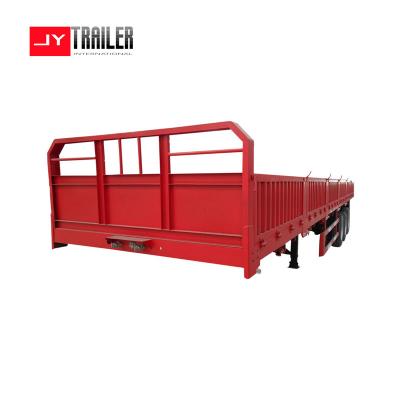 China Good price side wall flat bed semi trailer 3 axles steel transport cargo semi trailer for sales for sale