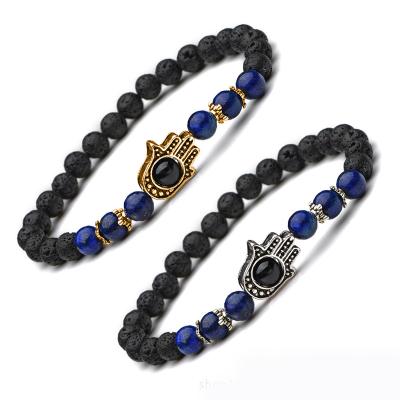 China Religious Hot Sale Hamsa Evil Eye Volcanic Stone Beaded Bracelet Hamsa Natural Stone Amulet for sale