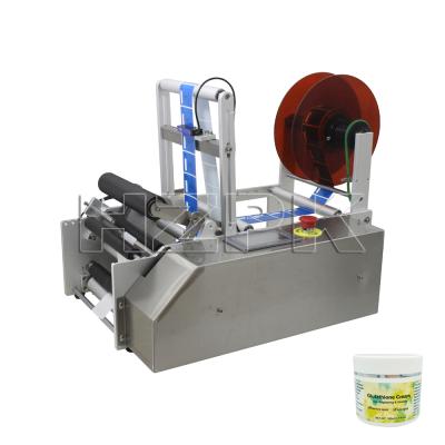 China HZPK MT-120 Semi Automatic Food Round Bottle Double Side Labeling Machine for sale