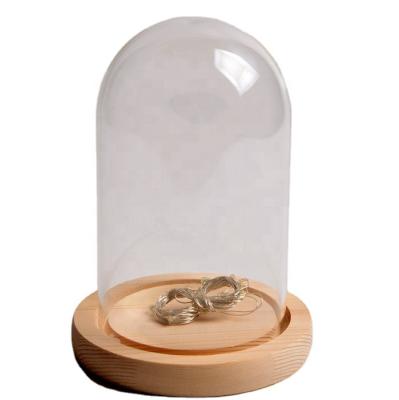 China The internal glass House decoration flower with wooden bottom, diameter 18cm lead glass dome glass bell for sale