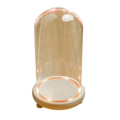 China Wholesale Art Wholesale folk handmade decorative clear led glass bell battery operated mini bell glass dome with wooden base for sale