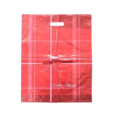 China Customized Red Die Cut Bag Printed Poly Plastic Recyclable Fold Over Punch Handle Bags for sale