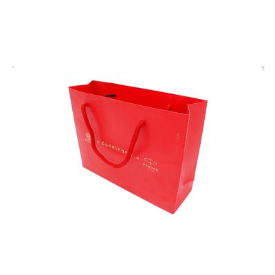 China Dongguan Recyclable Cosmetic Garment Shoes Food Gift Perfume Tea Disposable Shopping Paper Bag for sale