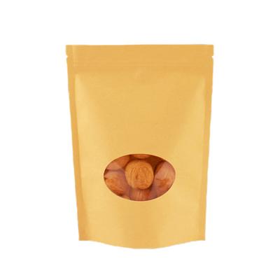 China Moisture Proof Biodegradable recycled customized stand up pouches dry food packaging brown kraft paper bags with translucent window for sale