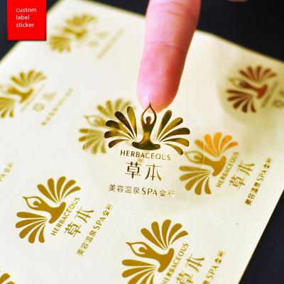 China Moisture Proof Printing Gold Foil Stamping Label Clear Custom Roll Logo Label Stickers for Packaging for sale