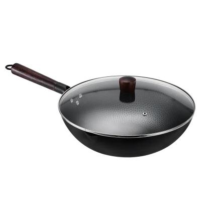 China Viable Chinese Hand Hammered Wok Wooden Handle No Coating Round Bottom Wok Pan Cover Metal Stove Pcs for sale